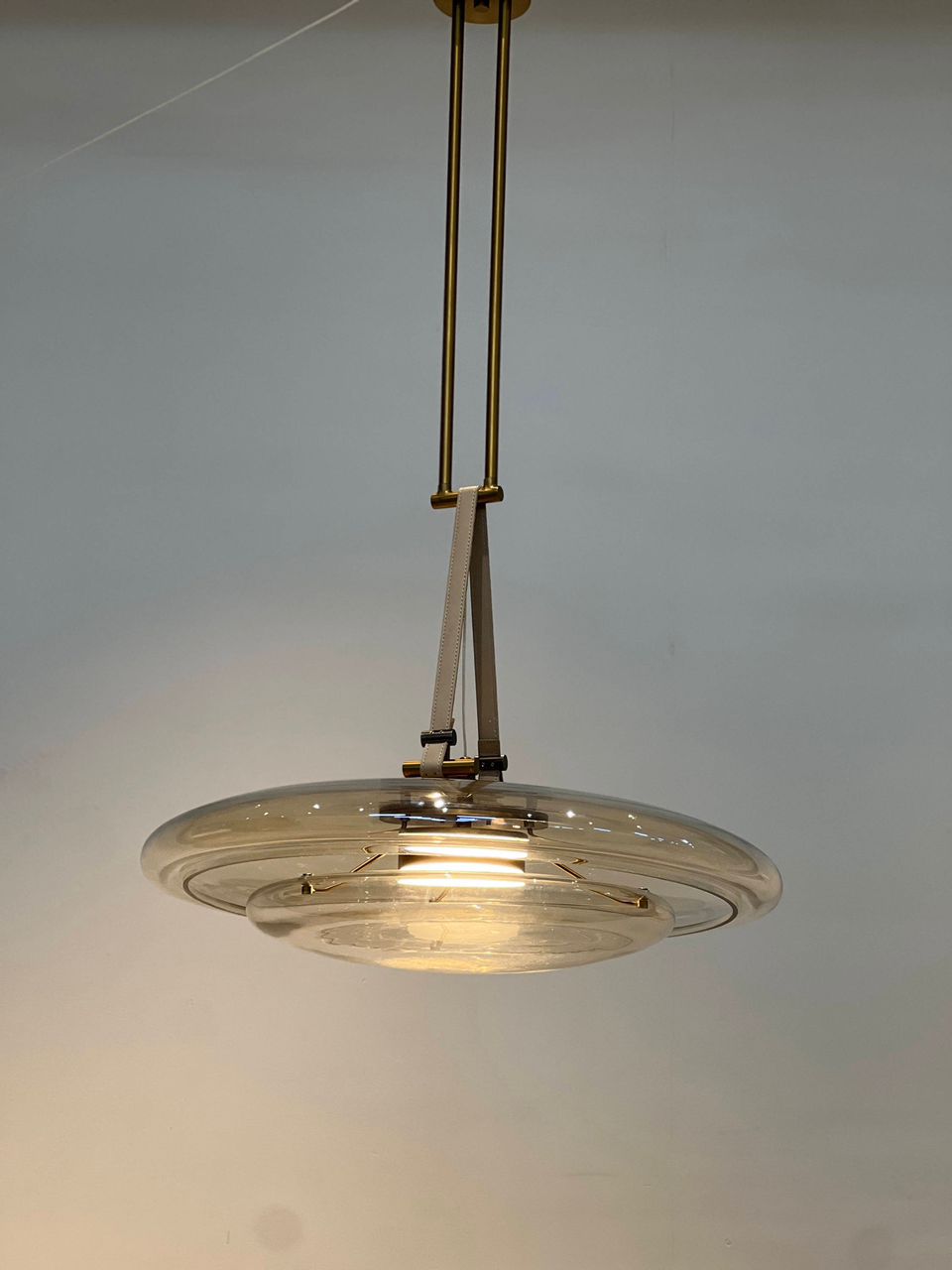 Custom gold ceiling strip lighting for a luxury interior