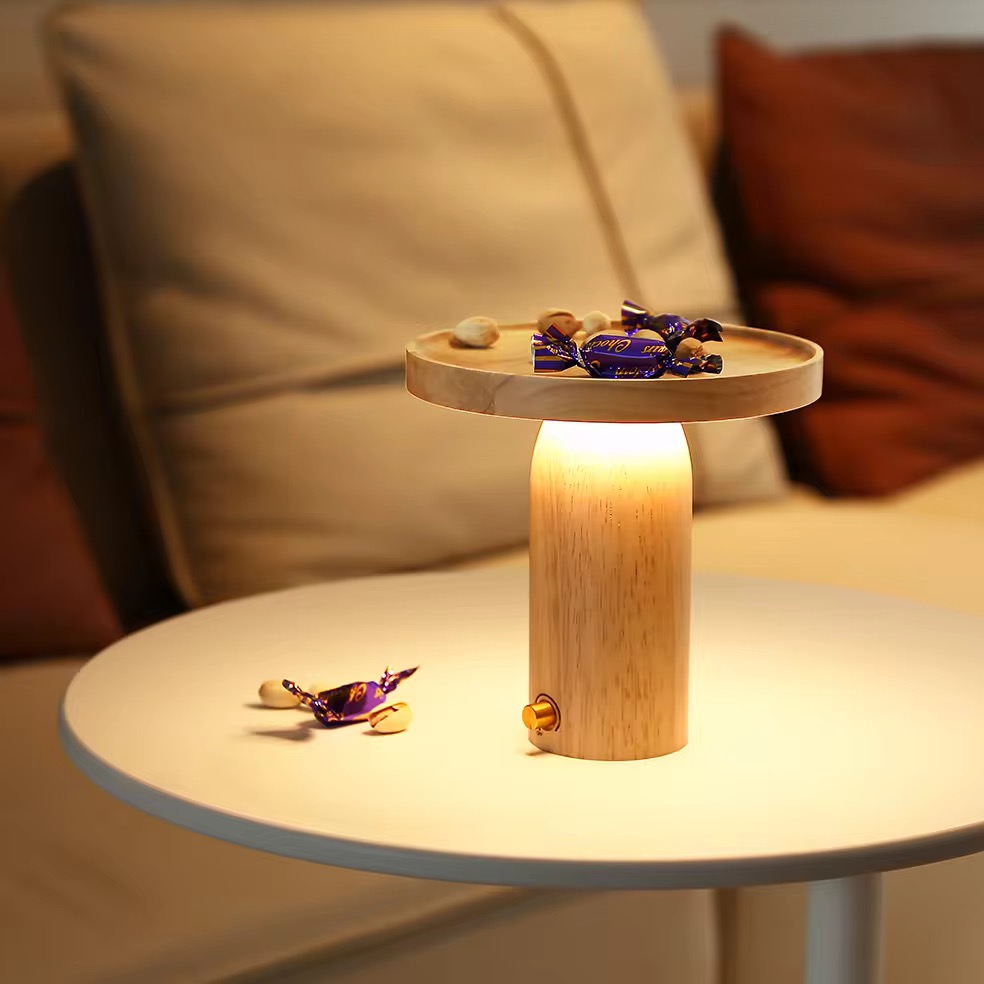 Small contemporary table lamp with a sleek minimal base